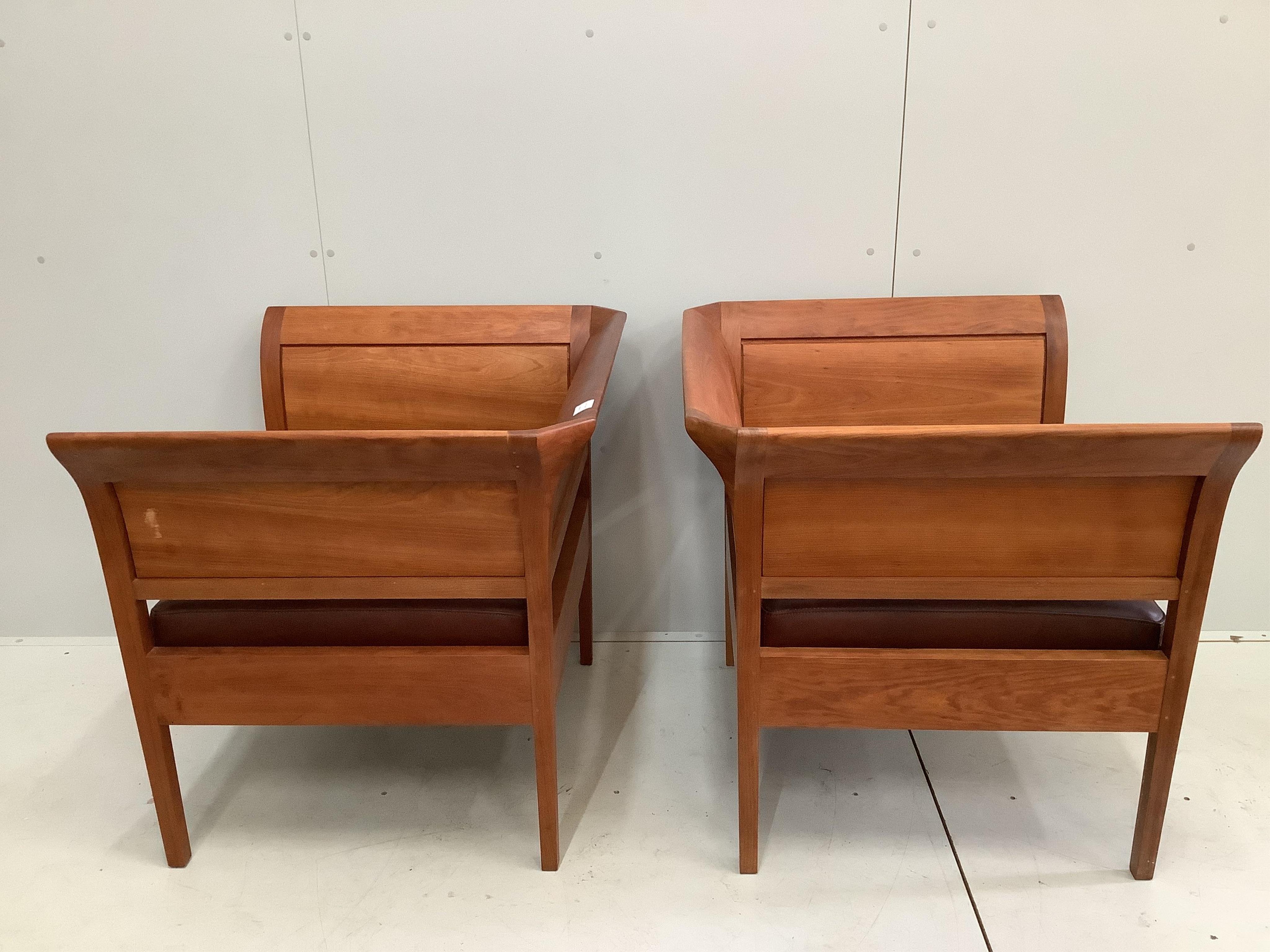 A pair of Thomas Moser cherrywood ‘Sofia Lounge chairs’, leather seats, width 89cm, depth 77cm, height 80cm. Condition - good